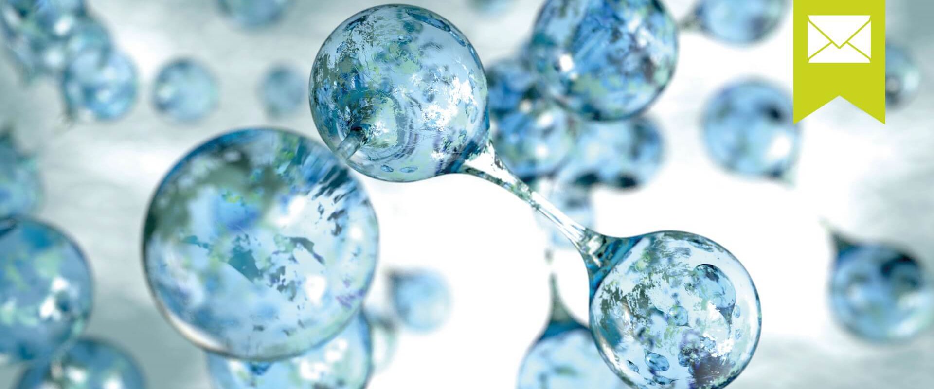 Schwebende Wassertropfen trennen sich